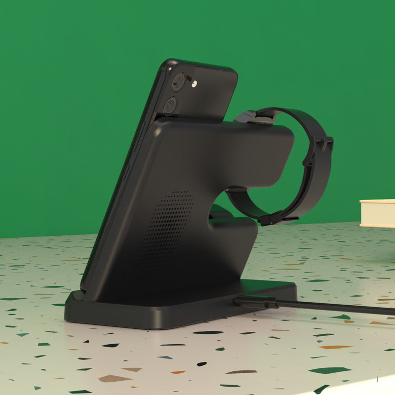 Black Samsung 3-in-1 wireless charger desk view