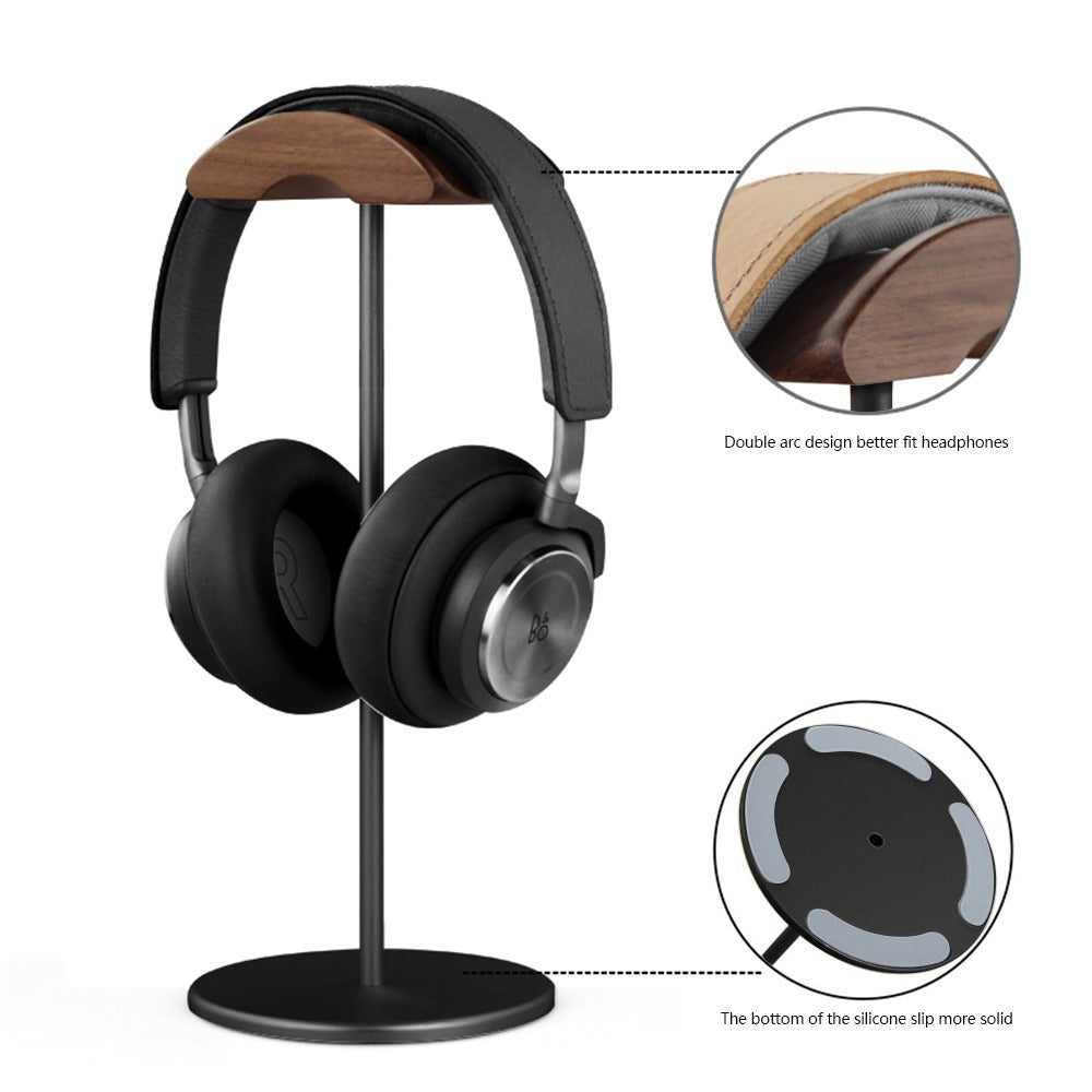 Aluminum headphone stand in Black with over-ear headphones on a desk