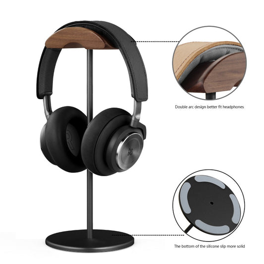 Aluminum headphone stand in Black with over-ear headphones on a desk